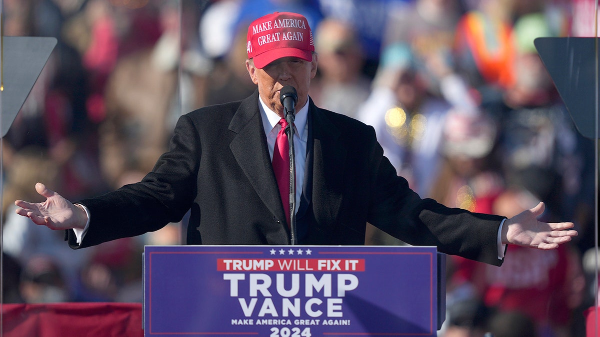 Trump in Pennsylvania is wearing a red hat 