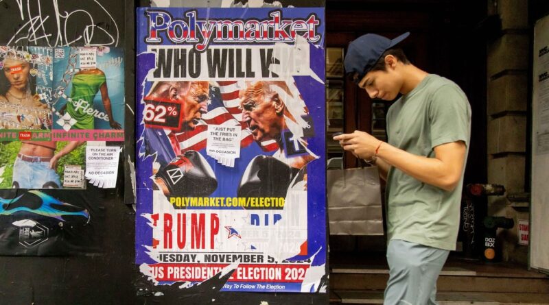 A man walked by a Polymarket advertisement in New York.